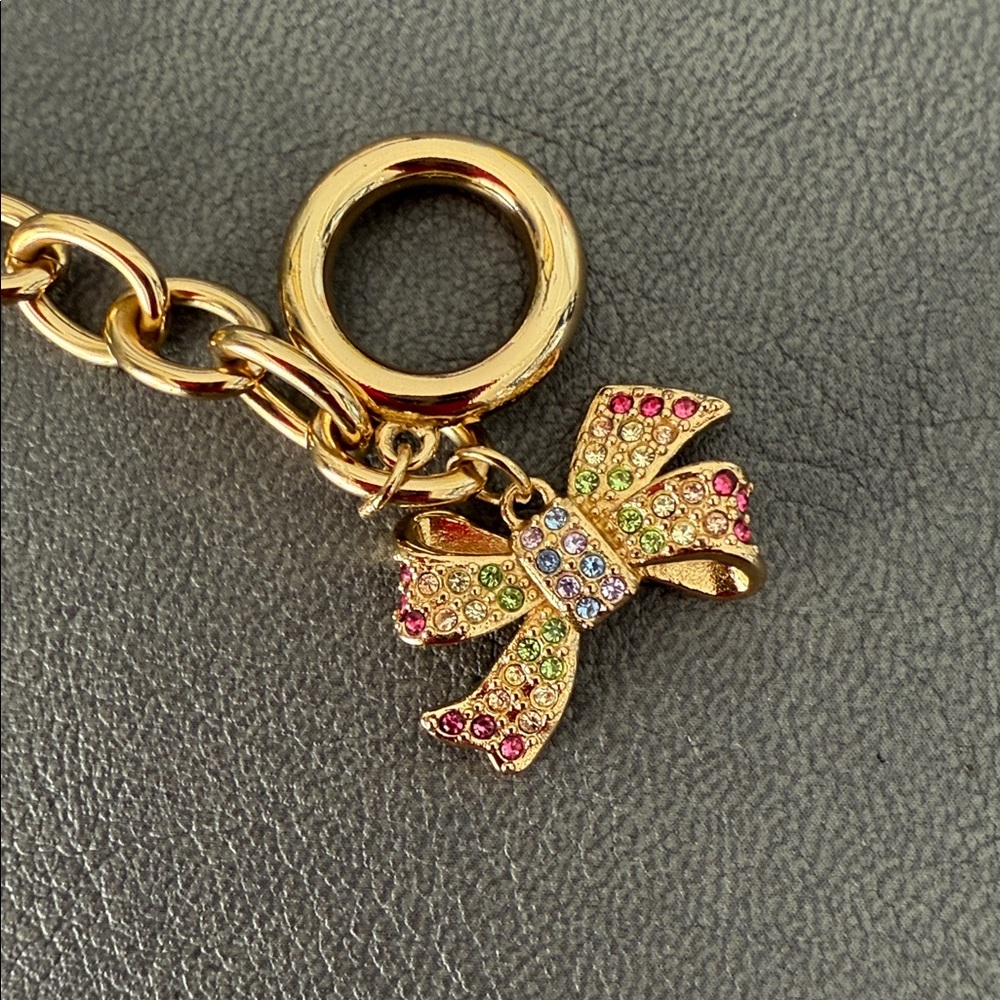 Coach Gold Bracelet with Multicolor Gem Encrusted Bow Charm New in Box - Picture 3 of 7